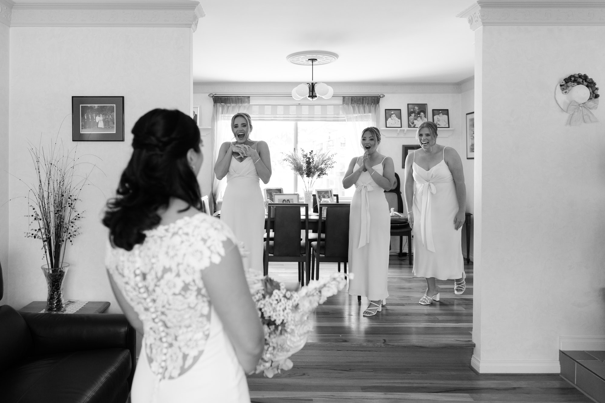 wedding photos Perth bridesmaids cheering seeing bride in dress for first time