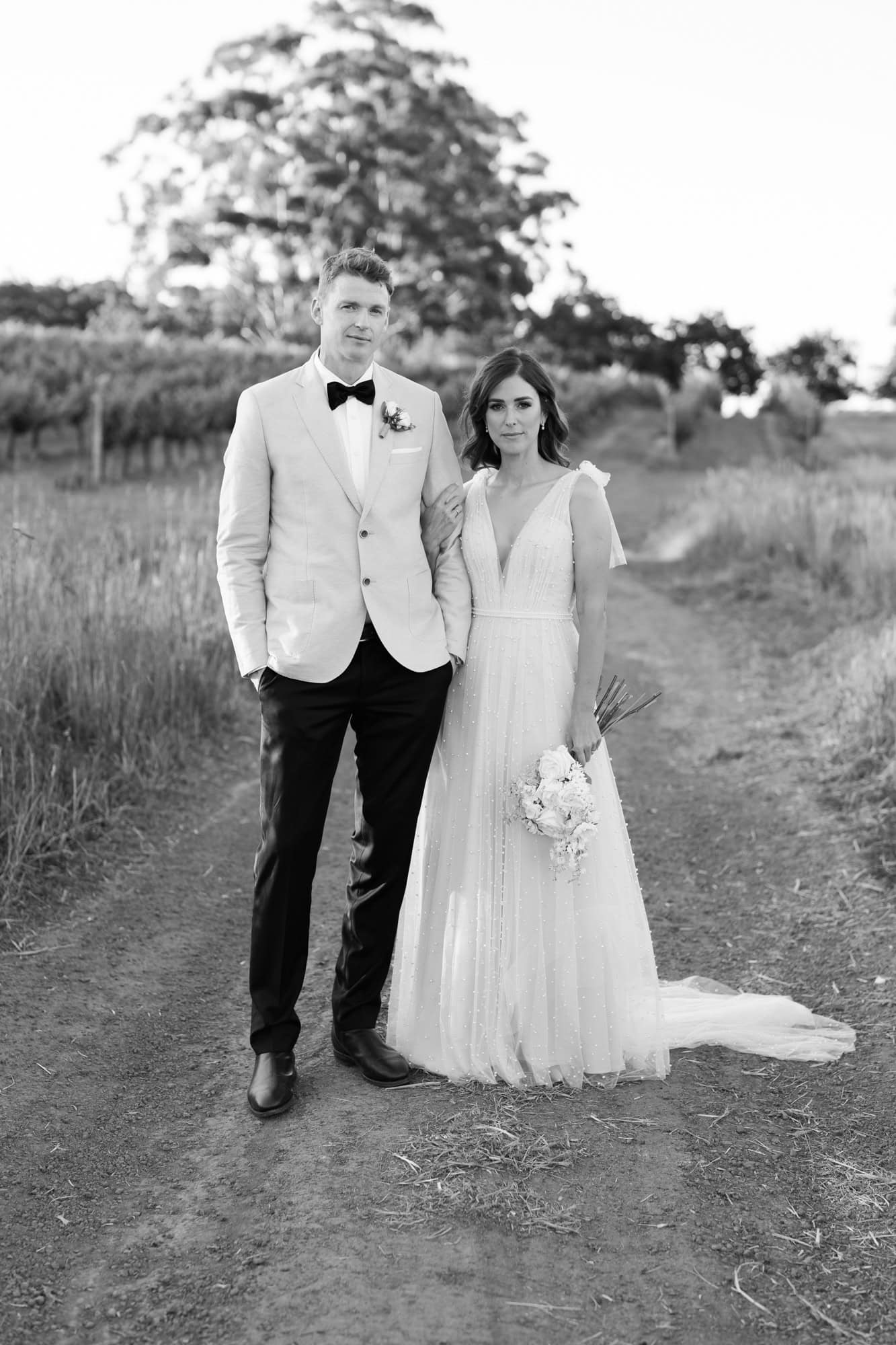 wedding photos Perth bride and groom standing on dirt road