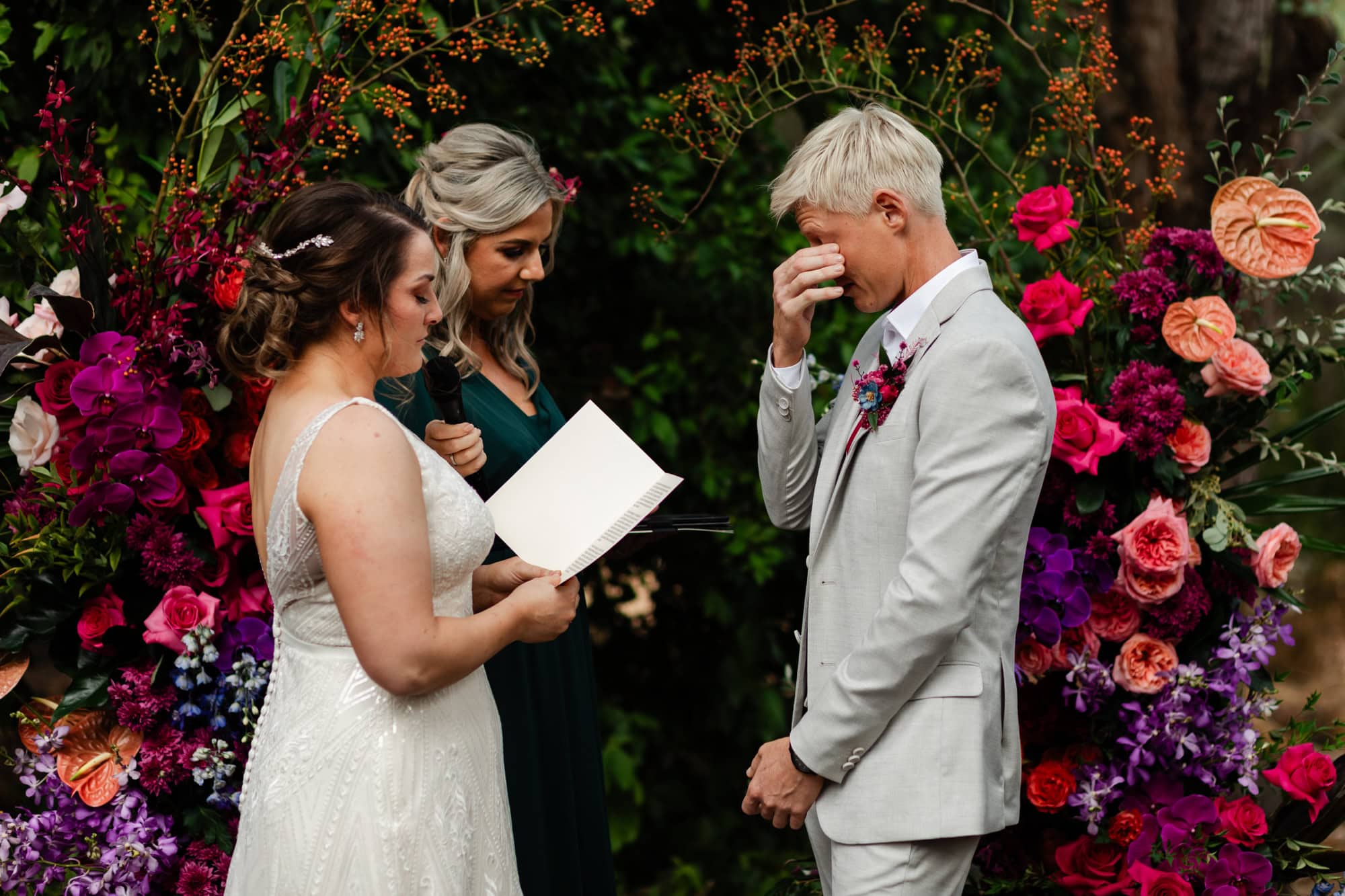 wedding photos Perth bride wearing white dress reading vows to bride wearing cream suit crying